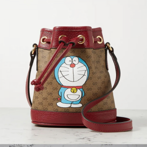 GUCCI + Doraemon textured leather-trimmed printed coated-canvas bucket bag £1,060 shipped