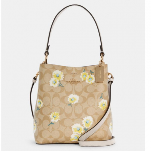 mini cally crossbody in signature canvas with daisy print