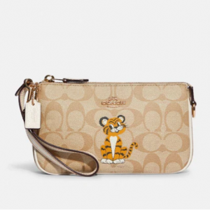 60% Off Coach Nolita 19 In Signature Canvas With Tiger @ Coach Outlet