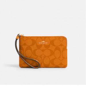 70% Off Coach Corner Zip Wristlet In Signature Canvas @ Coach Outlet 