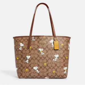 Coach X Peanuts City Tote In Signature Canvas With Snoopy Woodstock Print @ Coach Outlet