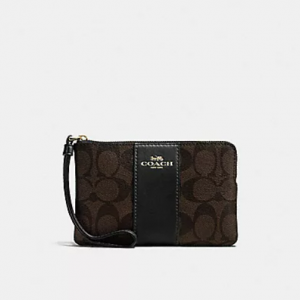 Coach Corner Zip Wristlet In Signature Canvas