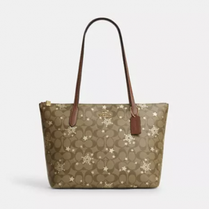 70% Off Coach Zip Top Tote In Signature Canvas With Star And Snowflake Print @ Coach Outlet