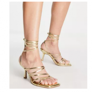 86% Off Asos Design Wide Fit Hiccup Strappy Tie Leg Mid Heeled Sandals In Gold @ ASOS US