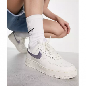 Extra 20% Off Nike Air Force 1 '07 ESS Sneakers in triple white and lilac @ ASOS US