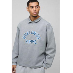 71% Off Oversized Worldwide Applique Half Zip Rugby Polo @ boohooMAN