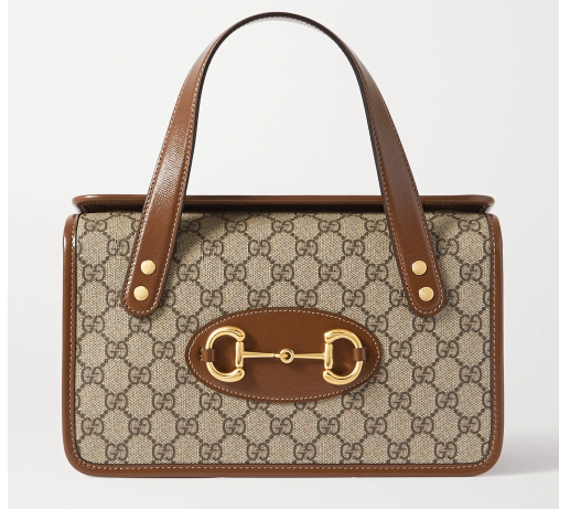 Gucci's '1955 Horsebit' bag features all of the same classic details that made it so popular upon first release - note the monogrammed coated-canvas and iconic gold hardware. Carried on the runway Gucci's '1955 Horsebit' bag features all of the same classic details that made it so popular upon first release - note the monogrammed coated-canvas and iconic gold hardware. Carried on the runway