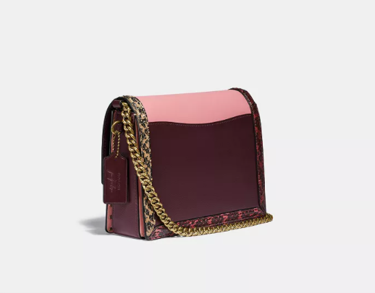 $297 (原价 $495) + 免邮Macy s官网 COACH X Jennifer Lopez Hutton 粉色小方包6折热卖 