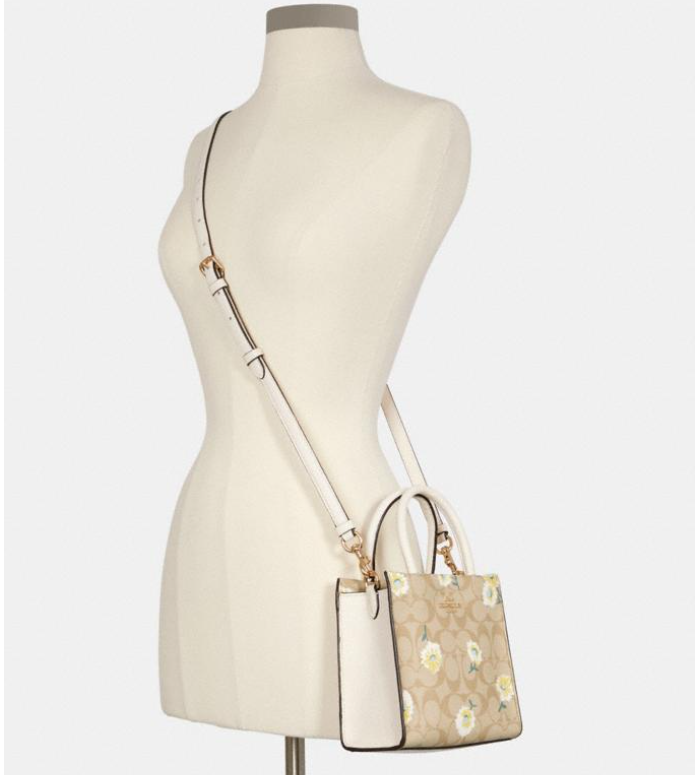 $164 (原价 $328) + 免邮Coach Outlet官网 Coach Mini Cally 雏菊手提斜挎包5折特卖 