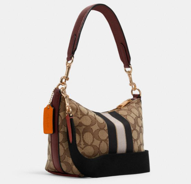 dempsey shoulder bag in signature jacquard with patch