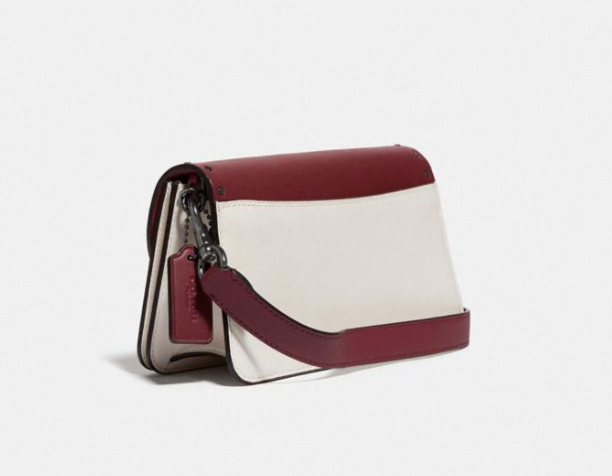 $187.50 (原价 $375) + 免邮Coach Beat Clutch斜挎包5折特卖 