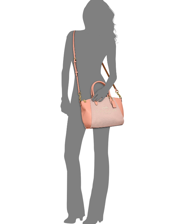 这款Coach Jacquard Elise马车图案手提袋采用抛光鹅卵石皮革和提花面料制成