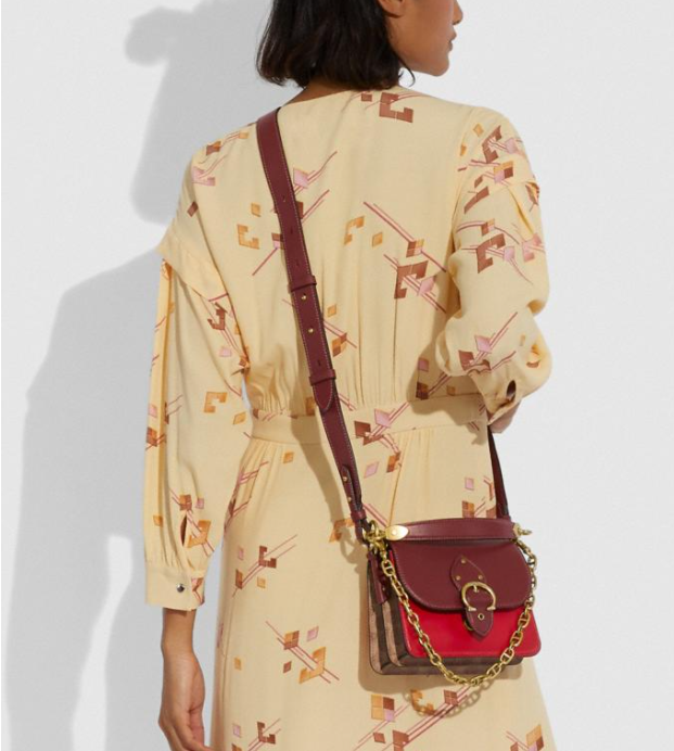 $225 (原价 $450) + 免邮Coach Outlet官网 Coach Beat 18 拼色铆钉斜挎包5折热卖