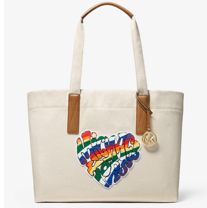MK这款托特包由耐用的棉帆布制成