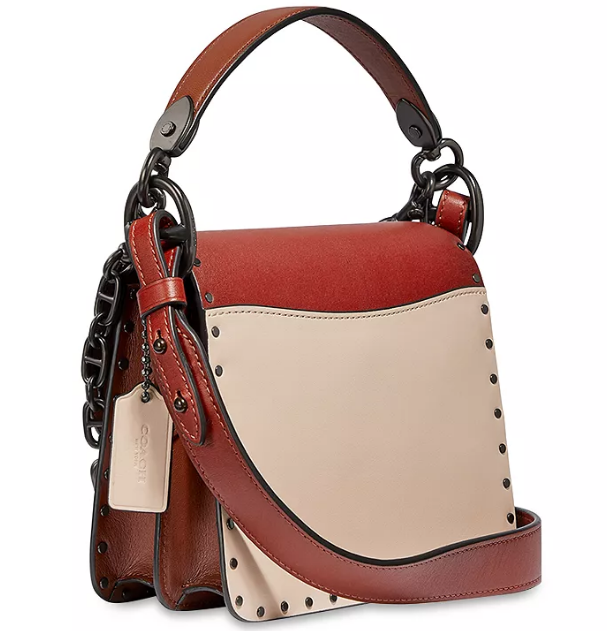 $297 (原价 $495) + 包邮Bloomingdale s官网  Coach Beat迷你撞色铆钉斜挎包6折热卖