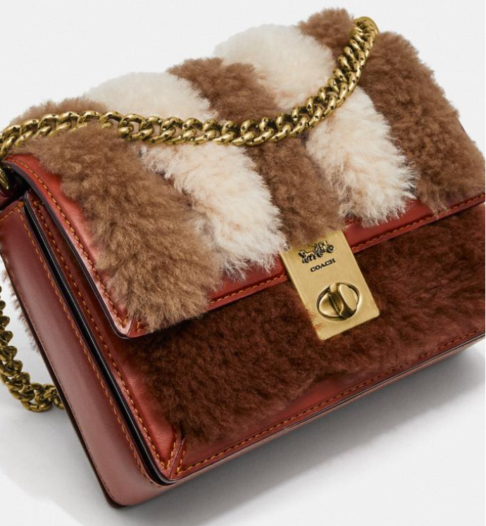 £180 (原价 £450) + 免邮Coach英国官网 Coach Hutton 18 毛绒链条单间包额外8折热卖 