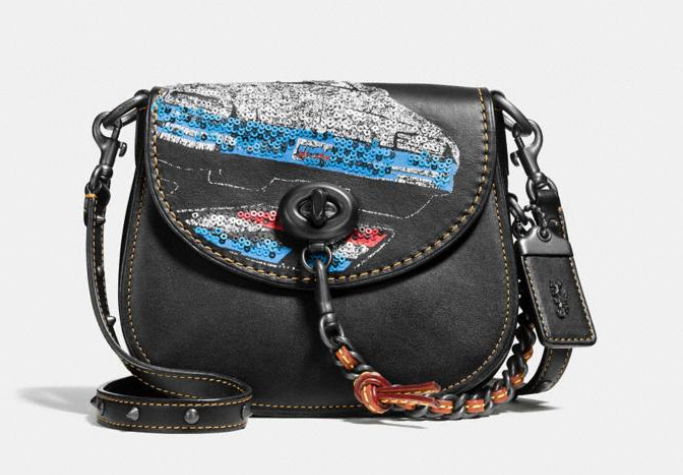 这款蔻驰马鞍包包型很复古别致 这款蔻驰马鞍包包型很复古别致