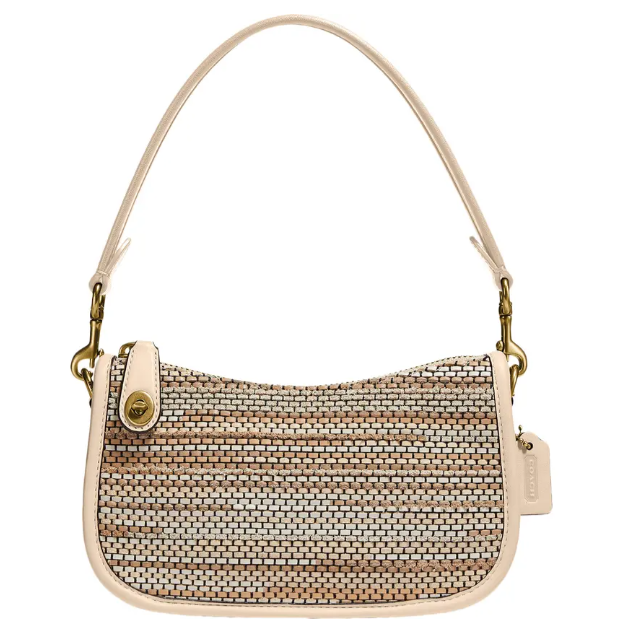 这款包包灵感来自80年代的复古单品