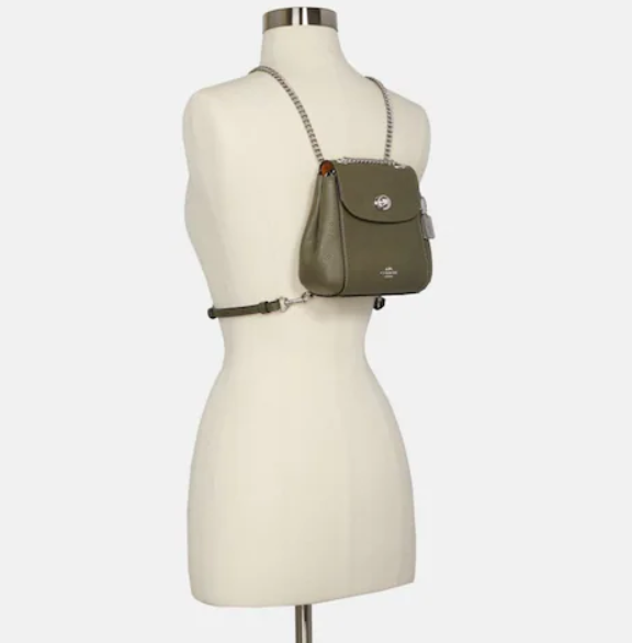 $98.40 (原价 $328) + 免邮Coach Outlet官网 Coach Convertible 牛油果色双肩包3折热卖 