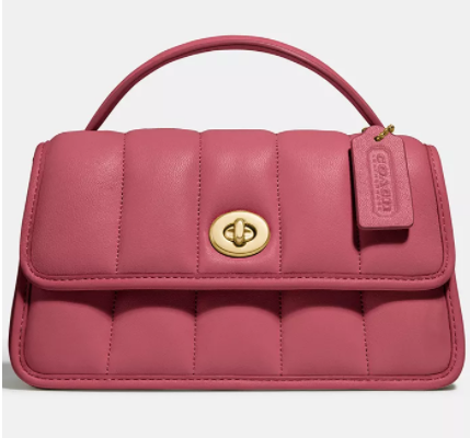 这款包包型很复古别致