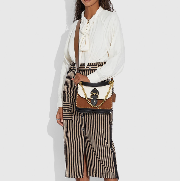 $357 (原价 $595) + 免邮Macy s官网 COACH Beat 拼色铆钉单肩包6折热卖 