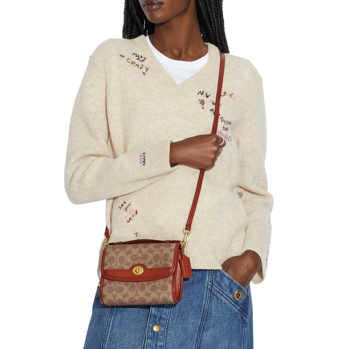 $157.50 (原价 $225) + 免邮Macy s官网 COACH Kip 老花斜挎包7折热卖 
