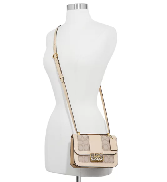 $297 (原价 $495) + 免邮Belk官网 COACH Alie 18 老花象牙白单肩包6折热卖 