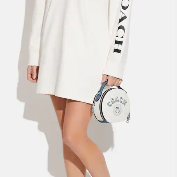 $159 (原价 $350) + 免邮Coach Outlet官网 Coach Canteen 徽章圆饼斜挎包45折热卖