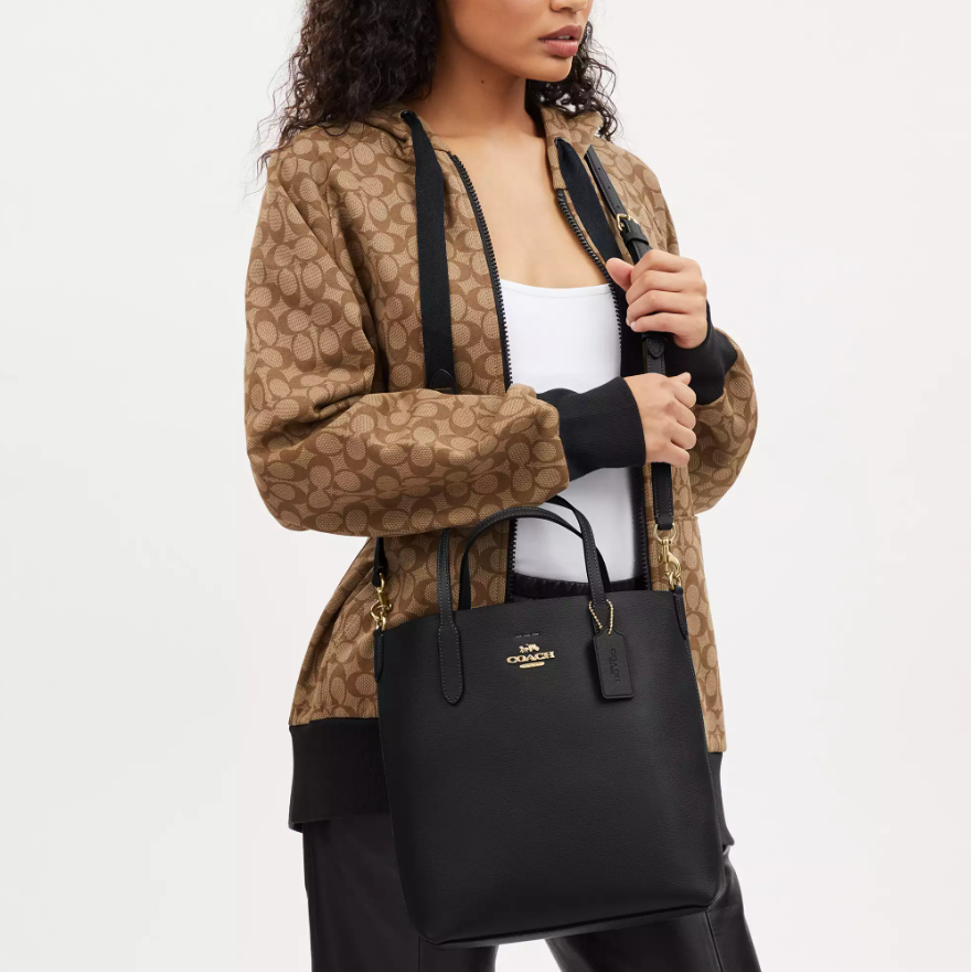 $140 (Value $350) + Free Shipping 60% Off Coach Small Thea Tote @ Coach Outlet