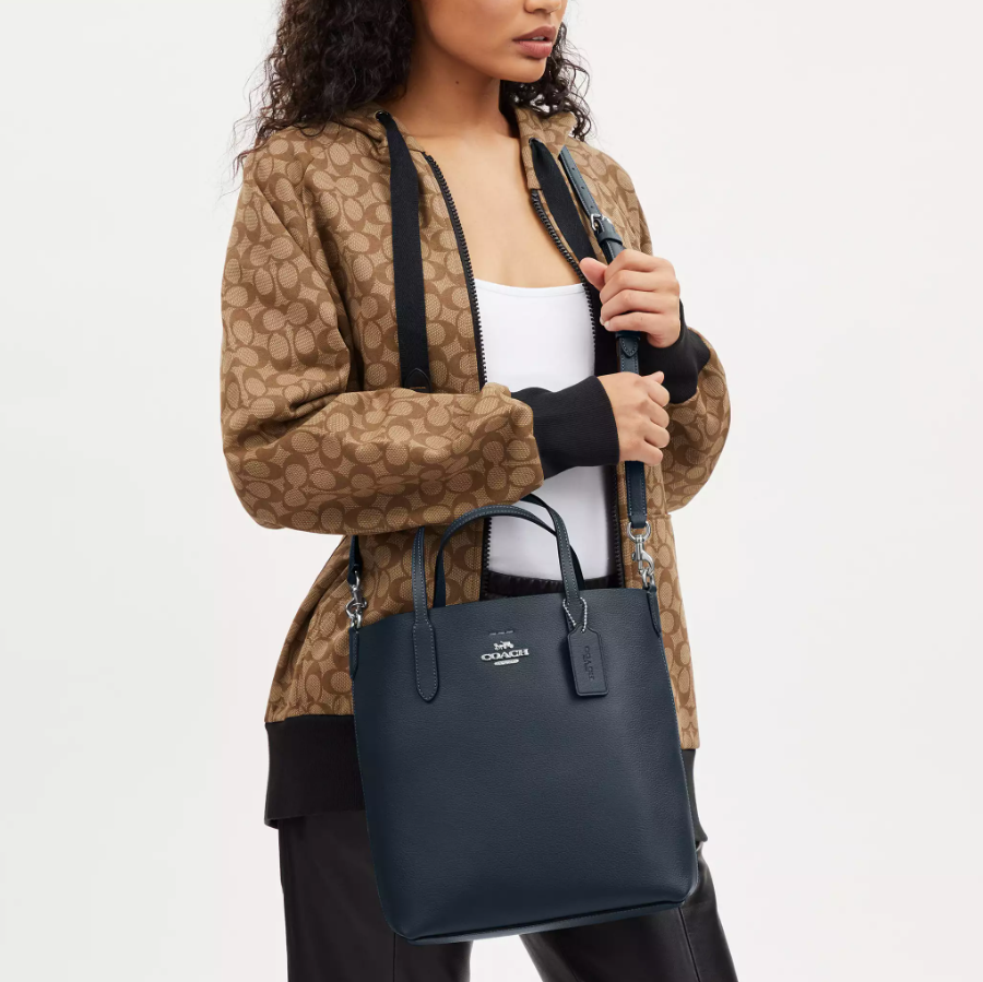 $140 (Value $350) + Free Shipping 60% Off Coach Small Thea Tote @ Coach Outlet