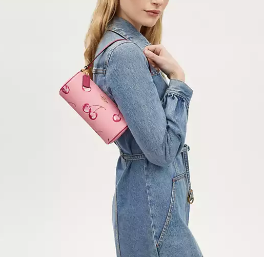 $79 (原价 $188) + 免邮Coach Outlet官网 Coach Nolita 樱桃印花笔筒包4.2折热卖 