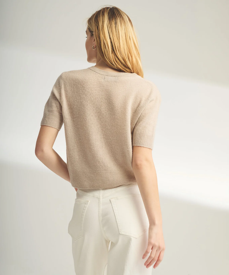 The Lightweight Cashmere Short Sleeve Cardigan is a soft The Lightweight Cashmere Short Sleeve Cardigan is a soft