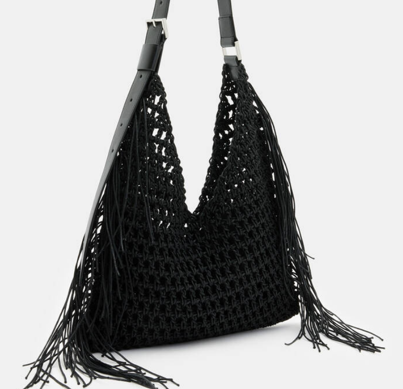 Summer styling just got interesting. The Sabine Bag features a macrame crochet design with fringed detailing down the sides. It's a bohemian moment. Summer styling just got interesting. The Sabine Bag features a macrame crochet design with fringed detailing down the sides. It's a bohemian moment.