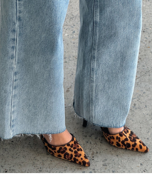 Take a walk on the wild side with the Wild Side Heels Leopard. Features a pointed toe design Take a walk on the wild side with the Wild Side Heels Leopard. Features a pointed toe design