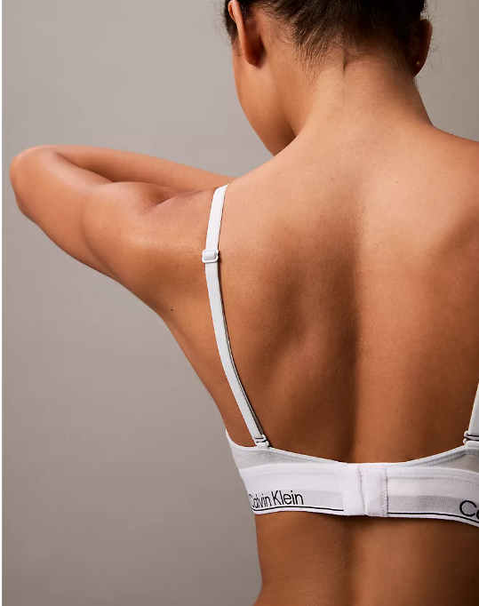 A Calvin Klein icon. This modern cotton bralette is the definition of effortless. Made with super soft and supple cotton stretch blended with modal for all day comfort. Designed with the original Calvin Klein logo band