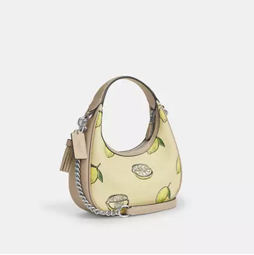 C$108 (原价 C$360) + 免邮Coach Outlet CA官网 Coach Carmen 柠檬印花迷你斜挎包3折特惠 