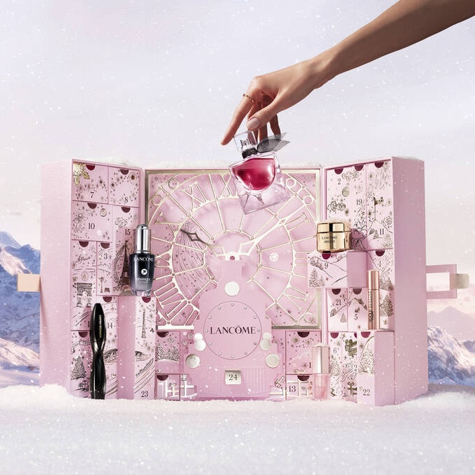 Lancôme Advent Calendar 2025 includes:Full-Size Idôle Power 0.85 fl. oz.Full-Size Monsieur Big Mascara in 01 Big is the New Black 0.33 fl. oz.Full-Size La vie est belle eau de parfum 0.34 fl. oz.Full-Size Lip Idôle Juicy Treat in 10 Pink Oh La La 0.28 fl. oz.Full-Size Cils Booster XL Mascara Primer 0.18 fl. oz.Full-Size L'Absolu Rouge Cream in 274 French Tea 0.12 oz.Full-Size Génifique Serum 0.67 fl. oz.La vie est belle Candle 2.5 oz.Rénergie HPN 300-Peptide Cream 0.5 fl. oz.Génifique Eye Ultimate 0.16 fl. oz.Lip Idôle Butterglow in 30 Lisa's Coral Glow 0.02 ozLash Idôle Flutter Extension in 01 True Black 0.06 fl. oz.Lash Idôle in 01 Glossy Black 0.08 fl. oz.L'Absolu Rouge Intimatte in 210 Unspoken Feelings 0.05 ozClarifique Double Treatment Essence in 1.69 fl. oz.L'Absolu Rouge Cream in 196 French Touch 0.05 oz.Lait Galatee Confort Makeup Remover Milk 1.69 fl. oz.Absolue the Eye Cream 0.16 ozTonique Confort 1.69 fl .oz.Idôle eau de parfum 0.16 fl. oz.La vie est belle Body Lotion 1.6 fl. oz.Absolue Longevity Cream 0.5 fl. oz.Trésor eau de parfum 0.25 fl. oz.Rénergie Lift Mutli-Action Night Cream 0.5 fl. oz.